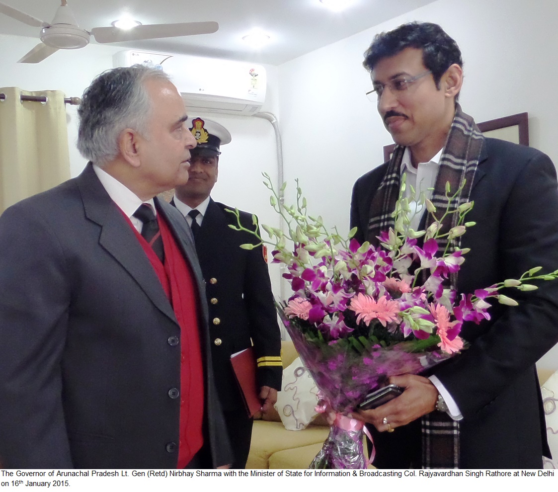 The Governor of Arunachal Pradesh Lt. Gen (Retd) Nirbhay Sharma with the Minister of State for Information & Broadcasting Col. Rajyavardhan Singh Rathore at New Delhi on 16th January 2015.